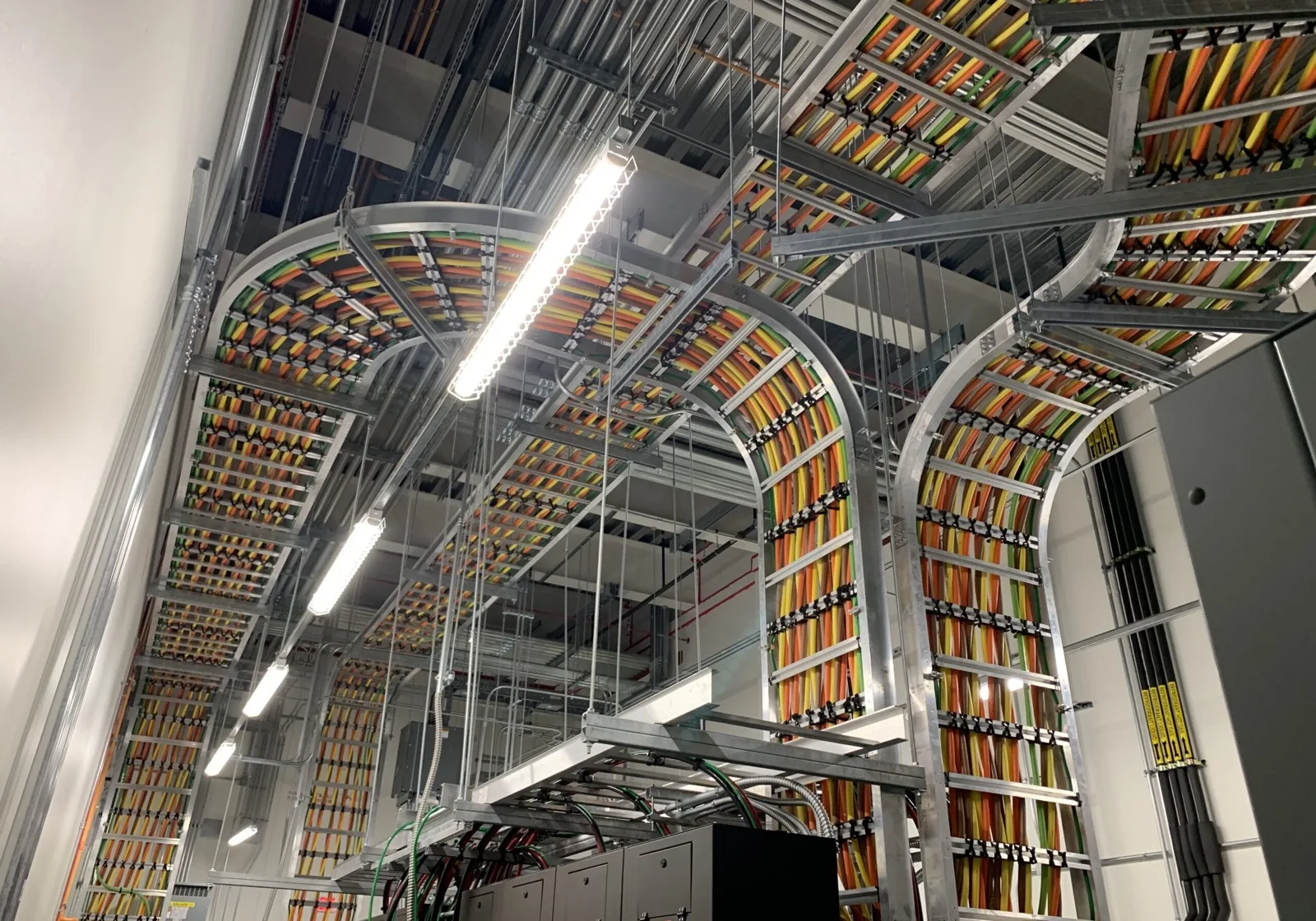 Industrial electrician working in a facility